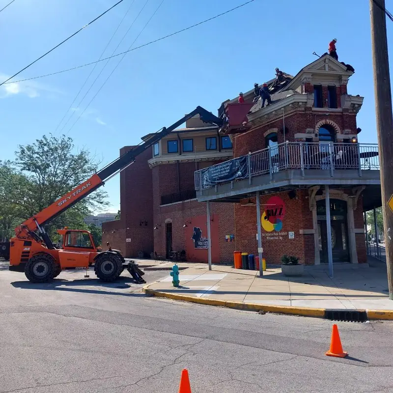 Rick's Roofing commercial roofing project on a brick building in Central Indiana